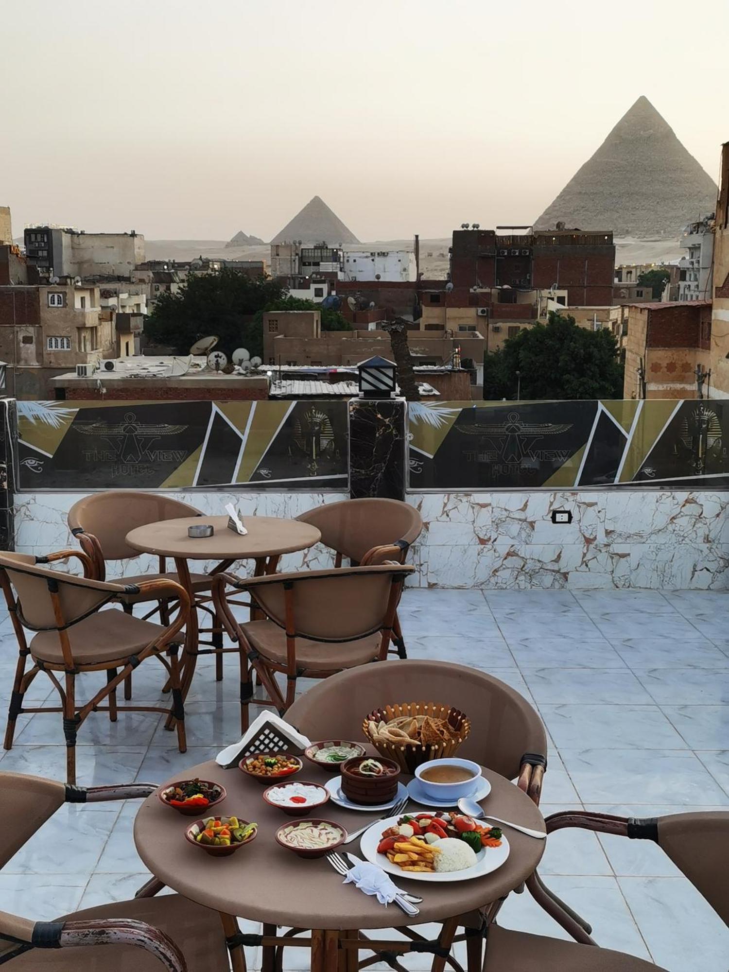 The View Pyramids Hotel Kafret el-Gabal Exteriör bild