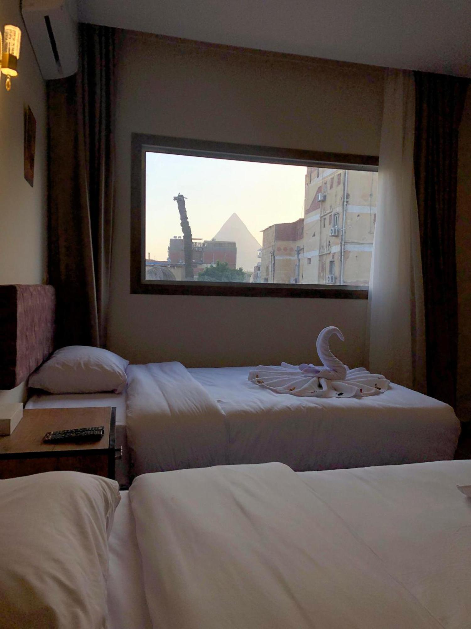 The View Pyramids Hotel Kafret el-Gabal Exteriör bild